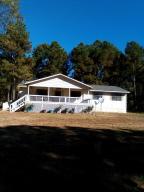 Picture yourself sitting on the big front deck and enjoy the beautiful 5 acres m/l of peaceful mountain side. There has been lots of brand new remodeling including NEW roof, flooring, paint and many other improvements.