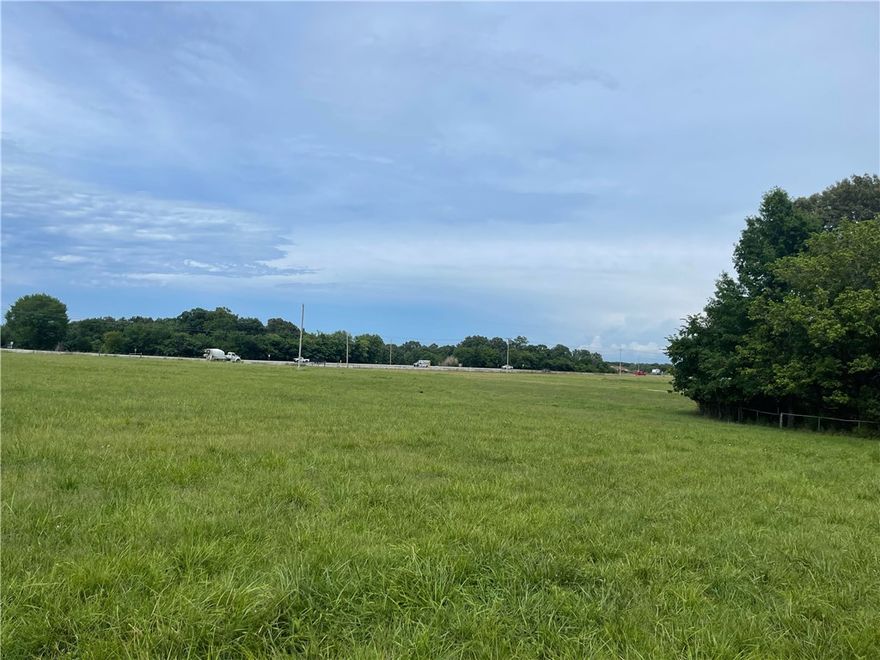 17.94Acres with 312' of Hwy 412 Frontage, East of Springdale. Fast-Growing Area with RV Parks, Mini Storage, and Convenience Stores in the area. $825,000. Buildings on the property are of no value. Tracts 1,2,3 sold together.
