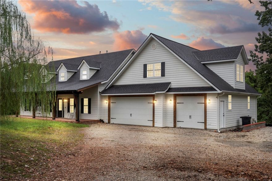 Welcome to 11174 Pumpkin Hill Drive, a rare Bentonville retreat combining privacy, versatility, and convenience. Set on 5 serene acres bordering land that is undeveloped, this property offers a sense of seclusion, and country feel just minutes from town, and a bike ride from Coler Mountain Bike Preserve. 

The residence features 3 spacious bedrooms plus a dedicated office and a flexible bonus room with its own private entrance; ideal for guests, a studio, a home business, or an Airbnb suite. With its separate entry, this space offers privacy and convenience, making it well-suited for short-term rentals. Its potential to generate additional revenue adds both lifestyle flexibility and investment value to the property.

Located within walking distance of Coler Mountain Bike Preserve, this home provides unmatched access to outdoor recreation while maintaining a quiet, private setting.