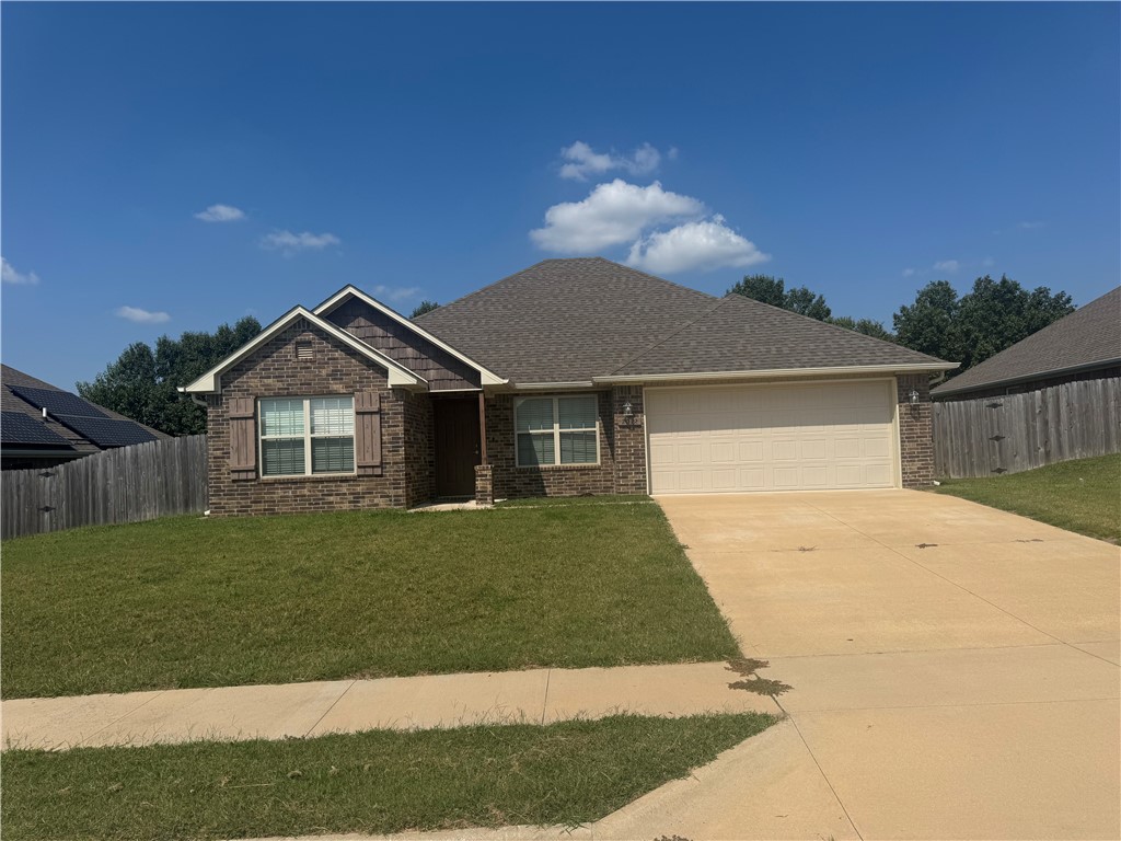 Welcome to this charming 4-bedroom, 2-bathroom home in the desirable Sunset Ridge neighborhood of Gentry, AR! Offering 1,543 sq ft of thoughtfully designed living space, this home features an open-concept layout with a spacious living room, modern finishes, and plenty of natural light. The kitchen boasts sleek cabinetry, ample counter space, and a breakfast bar—perfect for entertaining. The private primary suite includes a walk-in closet and ensuite bath. Three additional bedrooms offer flexibility for guests, a home office, or hobbies. Enjoy a fully fenced backyard, ideal for relaxing or playtime, plus an attached two-car garage. Conveniently located near schools, parks, and local amenities, this move-in ready home blends comfort, style, and functionality. Don’t miss the chance to call this one yours!