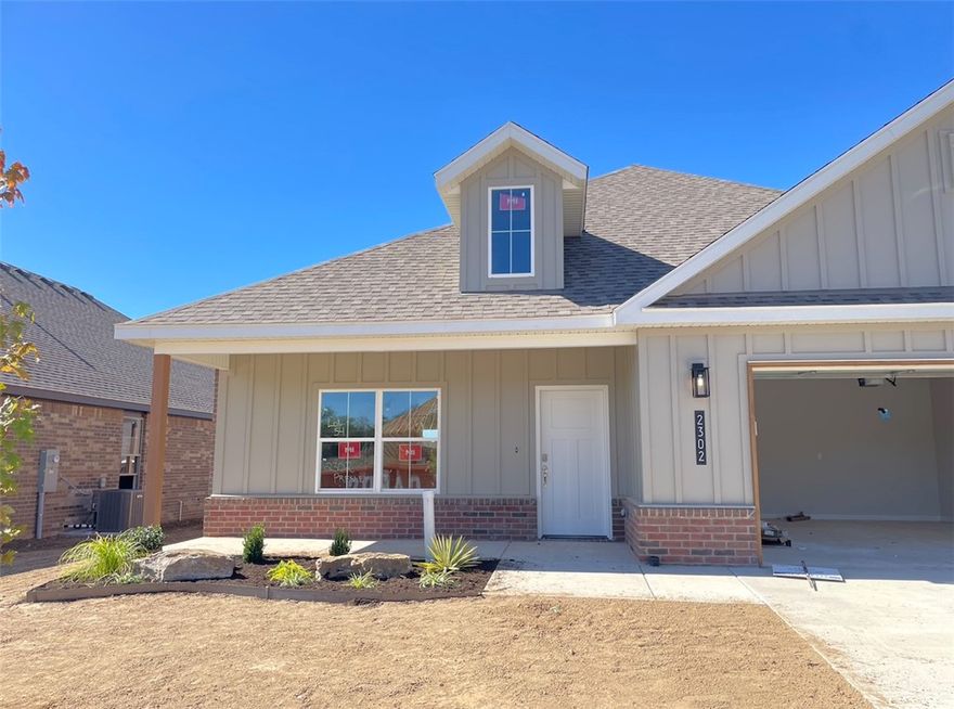 Beautiful New Construction Home in Heritage Ranch Subdivision! This 1,980 SF home has 3 bedrooms, bonus room on 2nd level, spacious open living, abundant storage, and large covered patio. Entry open into the living space, open layout is great for everyday and entertaining, with lots of natural light throughout. Gorgeous LVP flooring throughout the living areas. Living room features a beautiful fireplace feature. The kitchen is the heart of the home with great workspace, counter seating, large pantry, and open to a large dining room. Dining room has access to the covered patio and backyard space. The primary suite is a spacious and relaxing retreat with attached bath featuring a shower, soaking tub, and WIC. Upstairs is a large bonus room, a great second living space, playroom or media room! 2 car garage. Located next to Schools, Aquatic Center, and Parks. Nearby John Brown University and historic Downtown Siloam Springs. Welcome Home!
