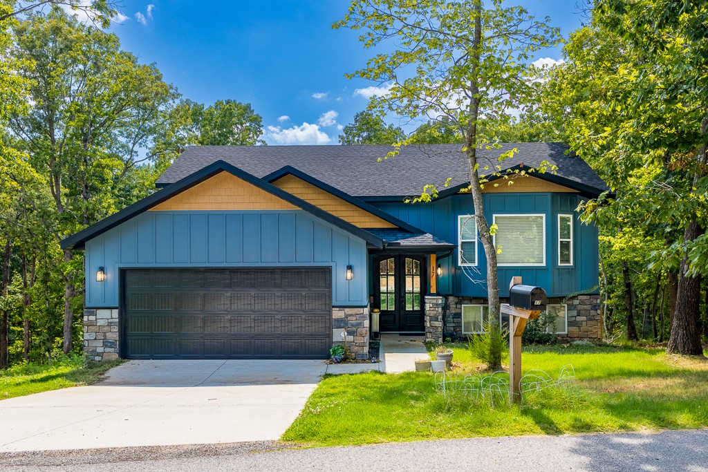 Located in the Grinstead neighborhood between Little Sugar Trail Head and Tweety Bird Trails, this next to new construction has been finished out downstairs and is ready for new owners! Walk in to soaring ceilings, natural light, warm wood floors and plenty of room for entertaining and relaxing. Enjoy watching the birds, having coffee, or grilling out on the back deck enjoying nature. This home has an open flow from kitchen to living room thatās perfect for gathering and entertaining. Primary suite offers walk in shower, soaking tub, and walk in closet. Downstairs you can find an additional living room, office area, two extra potential bedrooms, and one full bathroom. Minutes from the Bella Vista Country Club and I49. Enjoy the community this town has to offer with swimming pools, six golf courses, fitness centers, and closeness to all things NWA. Learn more about the city at bellavistapoa.com.