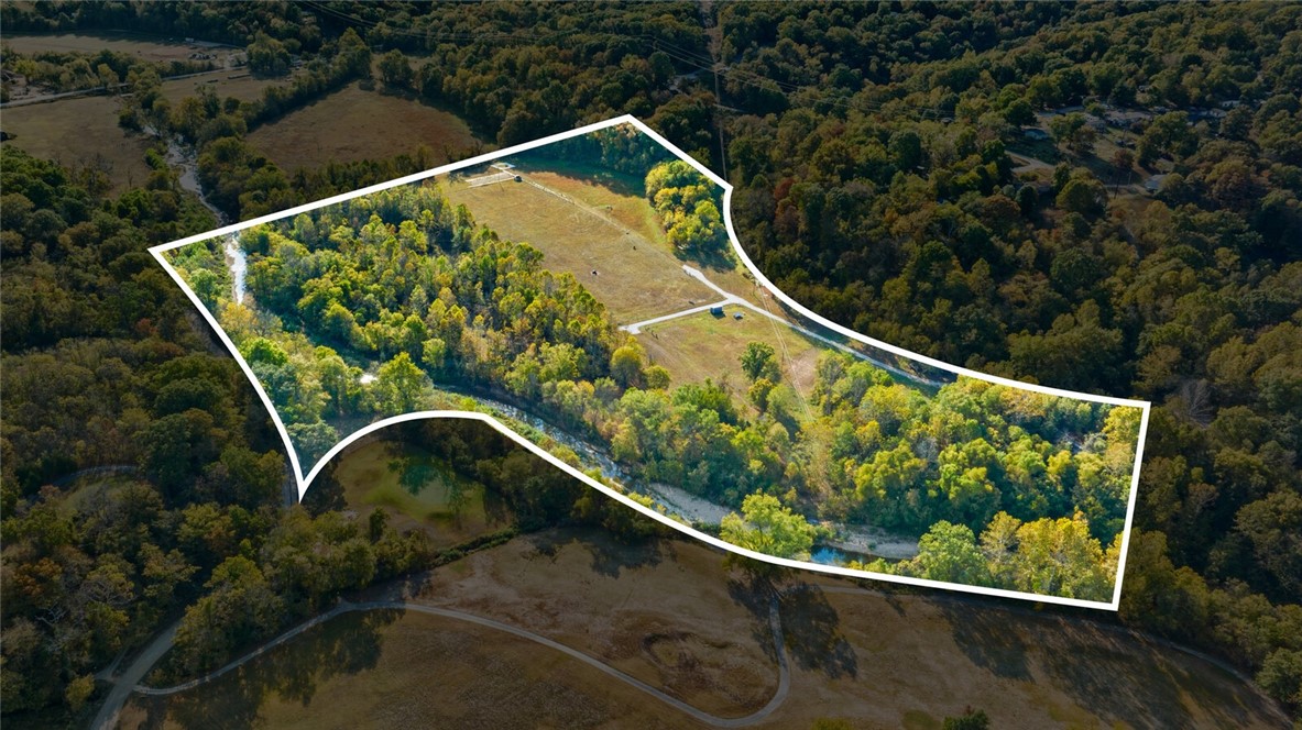 Build Your Dream Home on 26 Acres of Beautiful, Private Land! This stunning 26.001-acre property offers endless possibilities for creating your ideal retreat. With several potential building sites and open pastures currently being farmed, you have the opportunity to design a home that blends comfort, functionality, and sustainability. Imagine waking up to breathtaking views, surrounded by nature, yet still close to all the amenities you need. Whether you're dreaming of a spacious family home, a hobby farm, or a self-sustaining property, this land is perfect for your vision. Recent lot split, 26.001 acres. Additionally listed at MLS#1308197