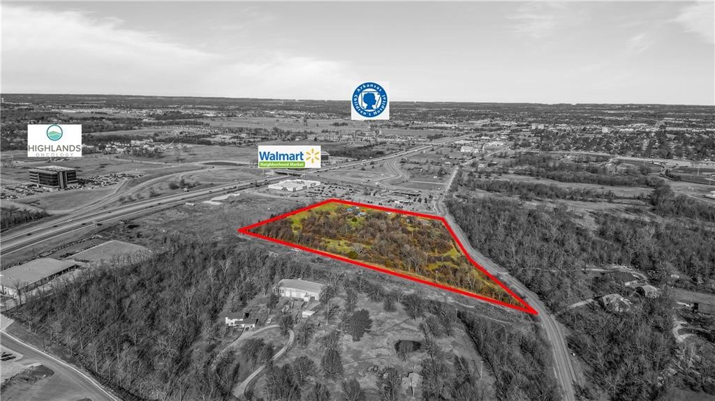 Amazing commercial land available for prime development opportunity. This 10.55 acres would be suitable for Commercial or multi family development. Conveniently located next to Walmart Neighborhood Market and Caseyās General Store with close proximity to Arkansas Children's Hospital, Arkansas Natural's Baseball, Sam's Club and several restaurants. Directly in between Fayetteville and Rogers, youāre right in the middle of the sought after NWA community Buyer will have access to the gravity sewer line to be installed along the western border. Buyer to confirm all items during due diligence period Also listed as commercial MLS# 1237442