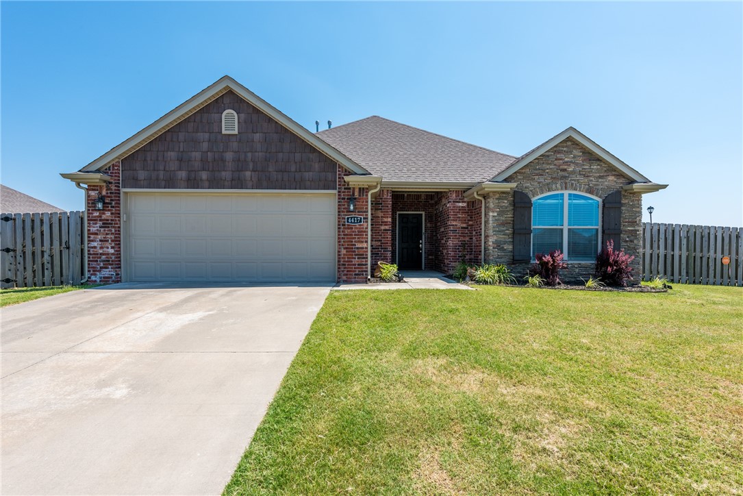 HOME SWEET HOME! Check out this 3 bedroom 2 bathroom home in the desirable Sloanbrooke Subdivision! Located minutes away from parks, schools, Wedington Dr, MLK, and University of Arkansas! Head inside to a spacious semi-open concept floor plan! The living room features wood flooring, gas fireplace & crown molding! Flow into the eat-in kitchen with granite counters, two bar height peninsula with room for additional seating, tiled backsplash, and stainless steel appliances! Large primary suite with continued wood flooring with private ensuite feat double sink vanity, jacuzzi tub, walk-in shower & walk-in closet! Plus two more bedrooms and an additional full bath! Enjoy the remaining summer months from the comfort of the covered patio in the fenced-in backyard! Don't miss out! Act now!