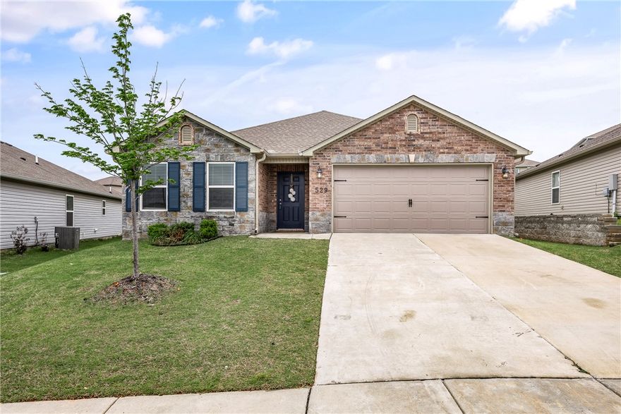 Like-new 2022-built home offering over 1,700 sqft with 3 bedrooms and 2 baths. APPLIANCES INCLUDED!!! Conveniently located in west Lowell with quick access to I-49, this all-electric home features paid-off solar panels keeping average utilities around $25/month. Enjoy an open-concept, split floor plan that’s perfect for modern living. The spacious lot provides plenty of room for kids, pets, and outdoor gatherings. Clean, efficient, and move-in ready—this home combines comfort, sustainability, and a great location!