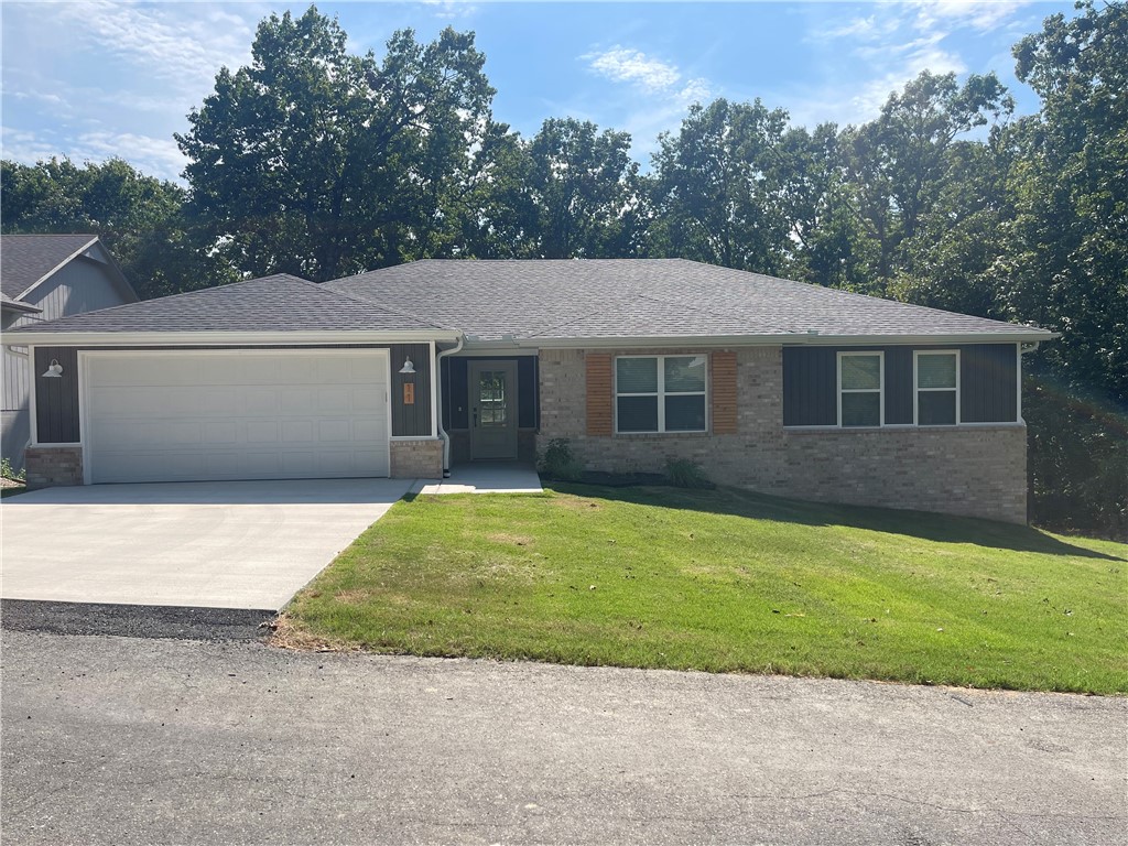 Gorgeous New Construction near the Branchwood Recreation Center and backs up to the Highlands Golf Course!!!!! The builder & designer went above and beyond on the details!! So much natural light
pouring into the living room, cozy fireplace framed by built in's and floating shelves. Open concept and
kitchen perfect for entertaining. Master bathroom with custom tile shower and free standing tub. The
bathroom leads into the large master closet......which leads to the laundry room for easy access to hang up your clothes straight from the dryer. Beautiful modern light fixtures, plumbing fixtures, and hardware.
Custom cabinetry & woodwork with a mixture of Quartz and Granite countertops throughout the home.
Smart Thermostat for Energy Efficiency. The exterior has a Ring Doorbell, custom cedar shutters, covered
deck, & attached 2 Car garage. Close proximity to new Interstate, Bike/Hiking Trails, Rec Centers, Golf
Courses, and Lakes!!!