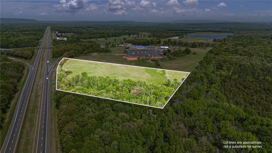 PRIME VACANT LAND – 15 Acres w/ Interstate Frontage | Atkins, AR

Looking for land that checks all the boxes? This 15-acre, flat parcel is ready for development and packed with potential. Located right off the interstate and next to the newly remodeled TA Truck Stop, it’s a golden opportunity for your next big move.
 Endless Possibilities – Perfect for your vision—whether you’re thinking commercial, residential, recreational, or investment.

High Visibility & Prime Location – Interstate frontage with consistent traffic flow

Truck Stop Adjacent – Tap into an existing high-traffic hub

Strategic Location – Easy access for travelers, truckers, and locals alike

This one’s a rare find—don’t miss your opportunity to own a prime piece of acreage or commercial land located in Atkins, AR. Reach out today to walk the property!