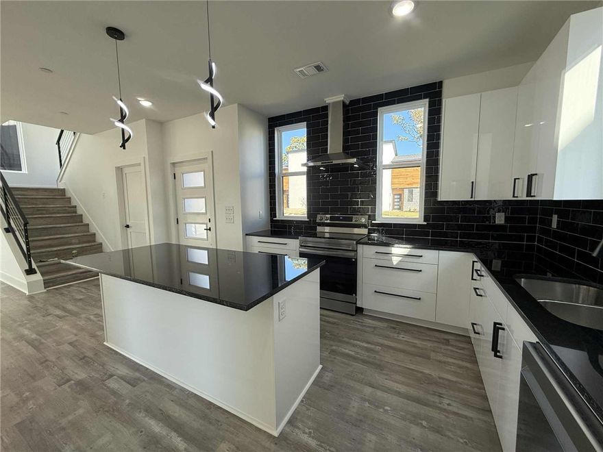 Seller to provide $5,000 credit toward closing costs or upgrades for the first 10 Homes Under Contract. Preferred lender offers a 1% credit on the loan amount, applicable toward closing costs, upgrades, down payment, or other eligible expenses. Enjoy an upscale, low-maintenance lifestyle just over a mile from Pinnacle Hills Promenade and only 2 miles from the Walmart AMP. Residents enjoy top-tier amenities including a saltwater pool, a clubhouse with a kitchen & gym, pickleball court, dog park, playground, paver streets, and bike paths. Live carefree with all lawn care and landscaping managed by the HOA, so you can spend more time enjoying your home and community. Each home features custom architectural design and high-end finishes, including Quartz countertops, gloss-finished black or white cabinets with soft-close hardware, and a curated palette of White & Gold or Black and White for a bold, modern look. Each home is equipped with modern interior fire sprinkler system, providing enhanced safety.