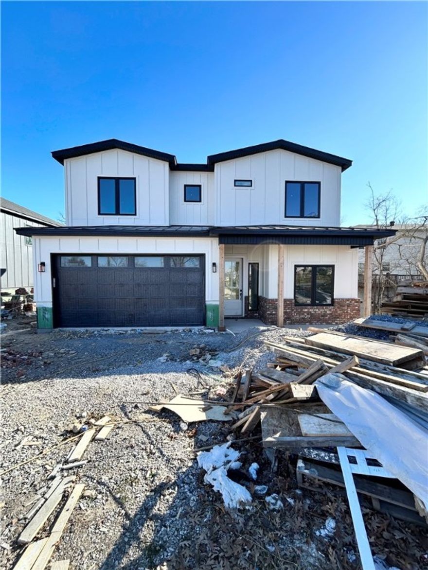 New construction home near downtown Bentonville! Just steps away from bike trails, schools, the Neighborhood Market, Airship Coffee, and provides easy access to Slaughter Pen Bike Park! This modern home features 4 bedrooms, 2.5 baths, and a versatile flex room. The primary bath boasts a custom tile shower and soaking tub. Open floor plan and an abundance of natural light throughout. Wood floors! (no carpet) The kitchen features floor-to-ceiling custom cabinets, 3 cm quartzite countertops, gas range, and a pantry. Oversized 2-car garage. Custom finishes throughout. As an added bonus, receive $3,500 towards buyer's closing costs when working with the builder’s preferred local lender!