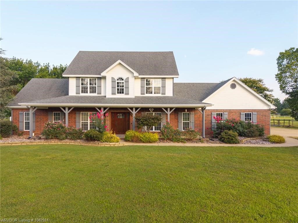 Beautiful 2882 sq ft Country Estate located on 3 beautiful acres just outside of town. Property has pipe fencing, a 48x60 ft barn with loft (could be a horse barn, workshop or used for storage), a gorgeous 20ft x 40ft concrete saltwater liner pool, a pergola and covered porch for entertaining. Also a small screened in porch , a 3 car garage, extra parking & a sprinkler system for the landscaping. The inside features 4 bedrooms, 3.5 baths with master bedroom down, an office, a flex room, an open kitchen with eat in dining & a dining room.The downstairs was remodeled a little over 10 years ago. The living room was enlarged & opened to the kitchen. Brazilian wood flooring added, granite countertops, dble glass doors & windows added in back to view the scenic outdoors & pool. The master bath now has a spacious tile & glass shower plus heated tile flooring & a towel warmer. This is a must see home. There are blueberry vines and fruit trees to enjoy as well.
