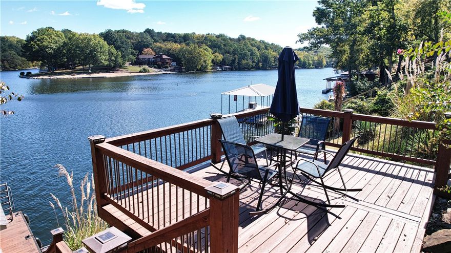 Welcome to this stunning Lake Windsor retreat, thoughtfully remodeled with modern updates throughout.  Enjoy breathtaking year-round views from the expansive open living areas.  This home features three to four bedrooms, including two on the main floor and two on the lower level.  The fourth bedroom on the main level is currently utilized as an office.  The main level boasts a luxurious primary suite for convenient single-floor living.  Downstairs, discover a fantastic family room complete with a wet bar, leading seamlessly to a covered screened-in deck and private hot tub--an ideal setting for relaxation and entertaining.  Additionally, the lower level offers a versatile bonus room, perfect for use as an exercise space, secondary office, or extra bedroom if needed.  Recent updates include a new roof, gutters, and HVAC system--all installed in 2021, ensuring comfort and peace of mind for years to come.  Don't miss this opportunity to experience lakefront living at its finest.  Schedule your private showing today!