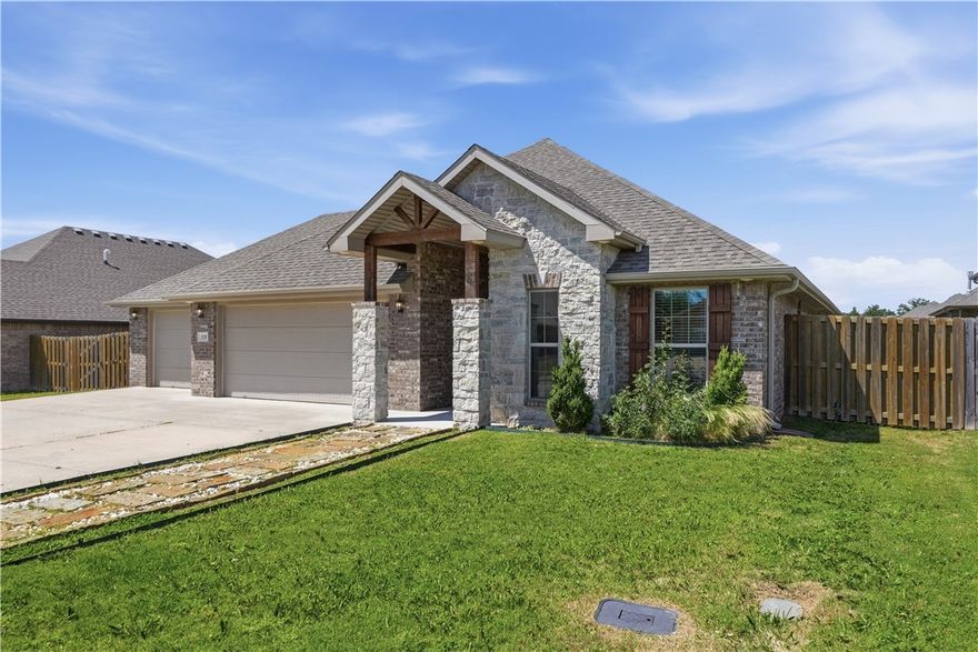 A very desirable Home, neighborhood & location A Schuber Mitchell Home. 3 car garage. Fenced in back yard w/ covered patio & fan w/ pavers leading to a fire pit. Open floor plan 4 bedrooms & 2 full baths. You are 10-15 minutes to downtown Bentonville & or the Walmart Campus. 10 minutes to Coler Mountain Trails. Mountain biking & walking park & all Family amenities you could ever. want nearby from shopping, great restaurants to trails to explore!  The picture with furniture is what it could look like- Virtually staged.