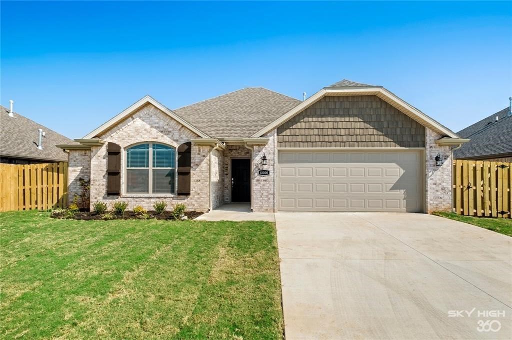 This beautiful new all-brick home features 3 bedrooms and 2 bathrooms. the split floor plan and open concept create a spacious and inviting atmosphere. The living room boasts a gas fireplace and crown molding, and throughout the home. The master suite is a highlight, offering a whirlpool tub, walk-in shower, and a generous walk-in closet. Additional amenities include energy-efficient features, a covered patio, a fully privacy-fenced backyard, a garage door opener with keypad entry, and pull-down attic storage.