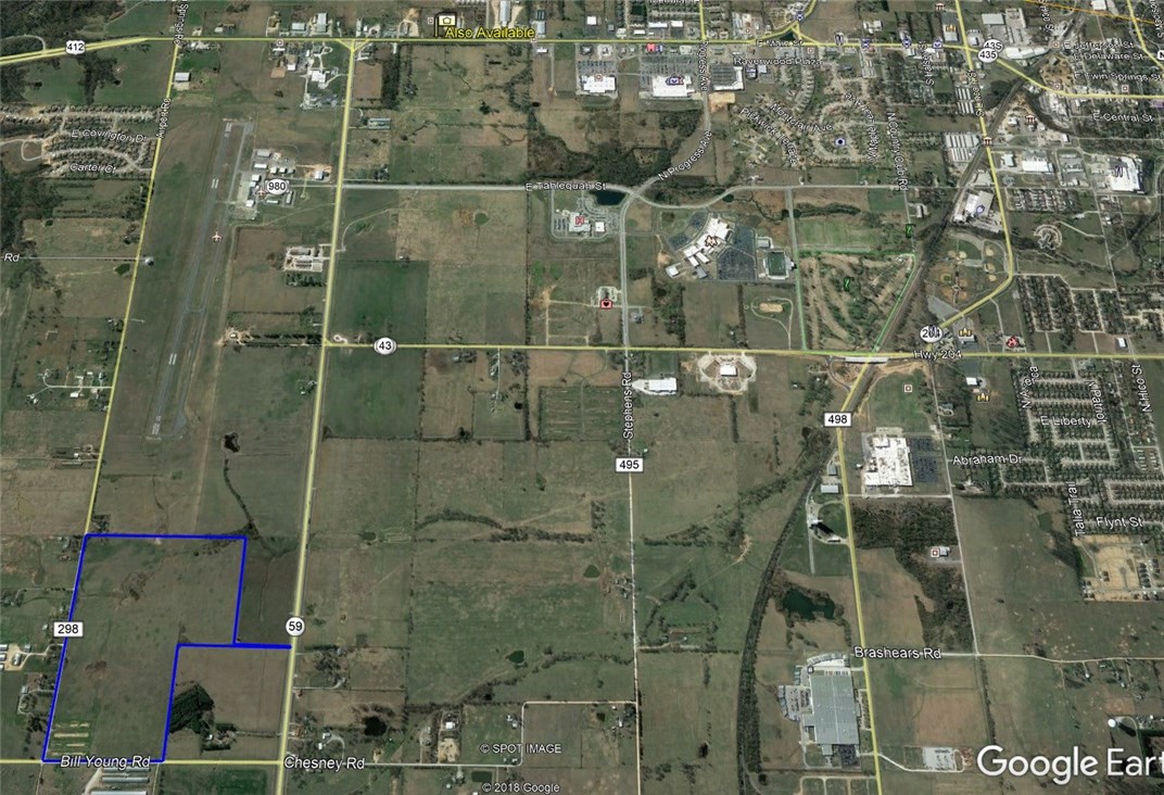 100+ acres of prime, open land! Frontage on both Bill Young Road and Airport Road with Hwy 59 access. Rural water, natural gas and electrical service from 2 companies available. Countless options-ready for development of commercial, industrial or residential. Access to Hwy 59 is deeded, not an easement.