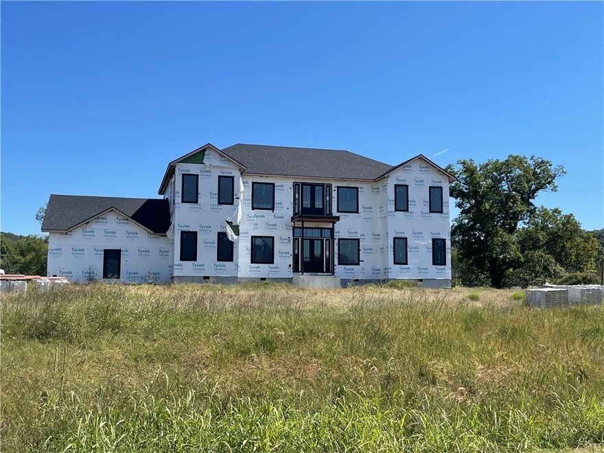 5000 Square Feet on the Beautiful White River. This remarkable property offers a river view from a covered balcony or patio. Home is currently under construction and awaits your finishing touches. Construction materials on site convey, with a complete inventory available. Rare opportunity for an executive home or retreat on some of the best trout waters in the state. Construction materials on site will convey to new owner. Home will require completion and completion is not included in listing price.