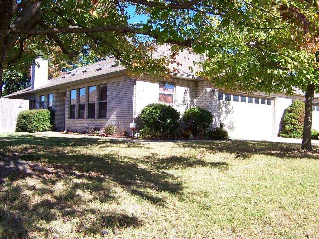 Main level has 2 BR & 2 BA, kit, DR, & living room. Upstairs has a BR, BA & office with lge work area and lots of cherry cabinets, file drawers, counter work dpace. Granite countertops and cherry cabinets in kit. Master bath has a whirlpool tub and walk-in shower. Beautiful wood floors. Private deck in back. No exterior maintenance requirement. Quiet and convenient - only 2 blks from WRMC and North Hills Medl Park. Easy access to I49 and the north Fayetteville shopping area. Will consider a small dog.