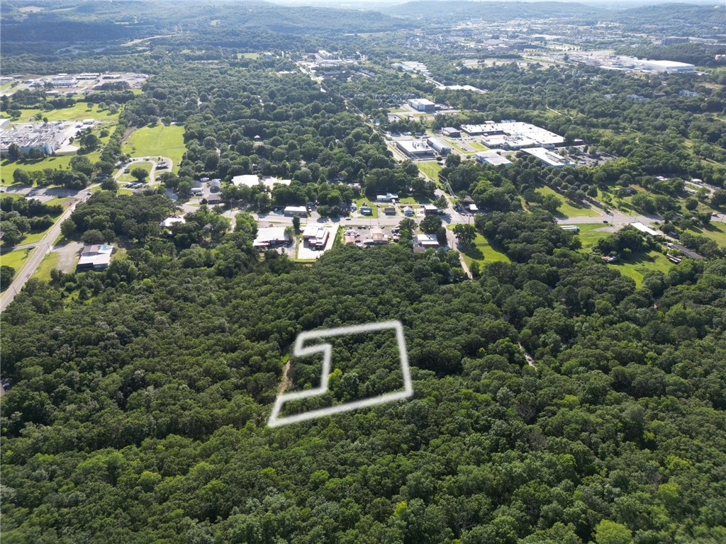 Can you imagine making a lot of money? This listing is vacant land in south Fayetteville. Near campus, and just off of S. School. This is a great location for rental properties, multi-family units, or whatever you can dream up! The land is zoned Residential/commercial! This listing is also tied to 4 other cash flow generating properties! With an annual rental revenue from seven units—five older trailers and two homes—these properties are already performing. The current owner occupies one home, with
a family member in another, but both could be added to the rental pool. These structures are in rough
shape and likely won't qualify for traditional financing, but for the right buyer, there's real upside here.
Whether you're looking for cash flow, land value, or future redevelopment, the numbers tell the
story.