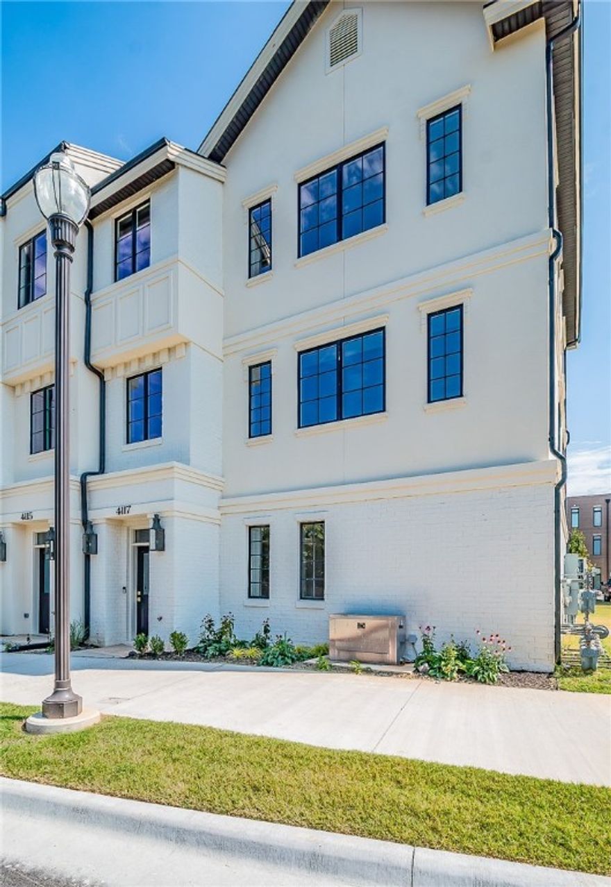 Located on the corner of Champions Drive and Pauline Whitaker Parkway, this stunning new construction brownstone is situated in the heart of Pinnacle’s urban living. The tastefully composed 2,499 sq ft residence is an end-unit and offers three bedroom, three-and-a-half baths with open concept living and entertaining spaces. The great room exhibits large windows that open to the gorgeous sunset over Pinnacle Country Club. The gourmet kitchen features a statement island and high-end appliances and finishes. The light filled primary suite offers a walk-in closet, and a spa like bath with a wet room. Located in Rogers’ newest community, with Pinnacle Heights retail, entertainment, and dining mecca just a stroll away. Property taxes estimated based on land only.