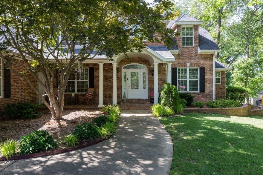 Unbelievable private wooded 1.4 AC oasis located in sought after Stonehenge.  Minutes to downtown Bentonville, Crystal Bridges, bike trails, & schools!  This beautiful, flat acreage is filled w/mature trees & new heated saltwater pool!  Southern charm exudes from every corner of the 4495SF home w/covered front & back porches, 4-5 beds, 4.5 bath, private study, 3 living areas, & 3-car garage!  Upper level BR's have ensuite bathrooms & walk-in closets. Exercise room, bonus room, & 5th bed possible. Bright, sunny & updated kitchen opens to the living room all overlooking the park-like backyard! 2 staircases, wood flooring, lg laundry, 4 fireplaces, built-ins, soaring ceilings, & so much more! Loads of storage. New roof 2020 w/gutter​​‌​​​​‌​‌​​​‌‌​​​‌‌‌​​‌​​‌‌​​​​ guards.