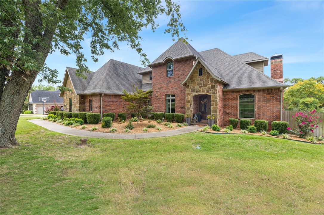 *$6,000 preferred lender credit available. Welcome Home to this beauty on an oversized 1.5 acre lot on a quiet road in desirable East Fayetteville. This home has plenty of room upstairs and downstairs to spread out. On the main level, as you enter the home you will see a formal dining room and office/study. The large living area that opens to the kitchen which can hold a large breakfast table and has floor to ceiling windows overlooking the expansive back yard. Additionally the primary bedroom and an additional bedroom with private bath reside on the first floor. A powder bath, craft room and large laundry room with another half bath round out the spacious first floor. If you desire a pool, you are already set with a back entry to the house in the laundry room that offers a half bath. Upstairs you will find three bedrooms two with a jack and jill style bath and one with its own private bathroom and a large bonus room. Attic space is abundant on the second floor.