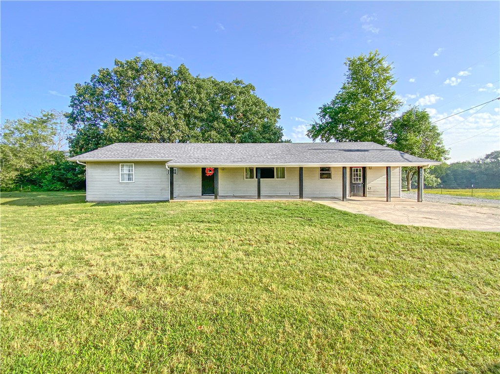 Home in the country on 1.48 acres. This home has new roof, lighting and plumbing fixtures and has been completely remodeled. Three-bedroom two bath could be four bedroom. A large room off the living room could be used as a master suite with walk in closet and bathroom or could be a perfect family/game room. Level yard with views of pastures and large shade trees in back yard and an apple tree in front. Less than a mile off Hwy 178 and less than 3 miles to Wal-Mart. Only a few miles to Bull Shoals Lake or White River.