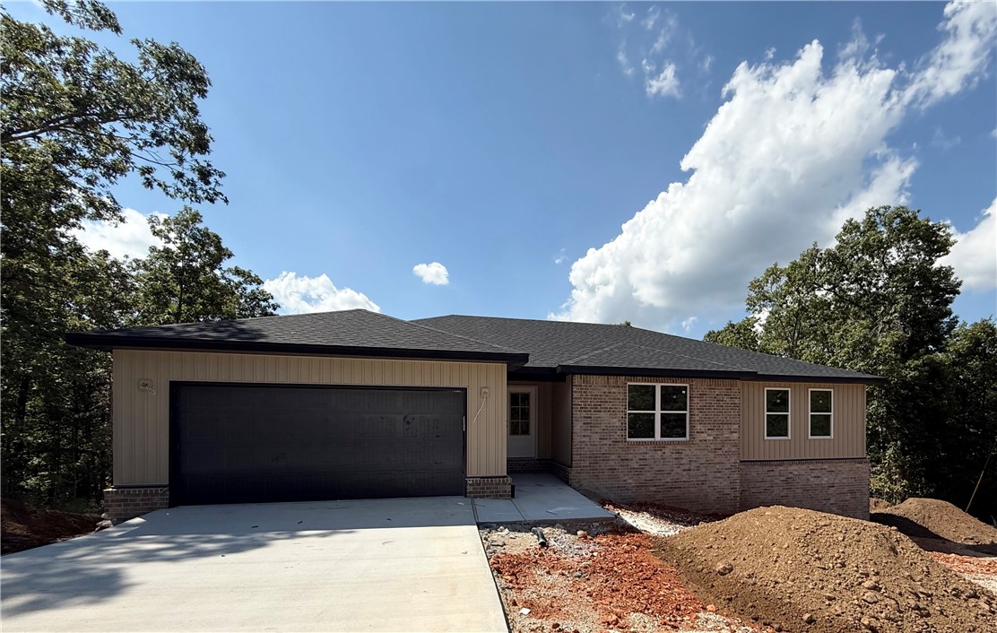 Gorgeous New Construction just a golf cart ride away from the Highlands Golf Course!!!!! The builder & designer went above and beyond on the details!! So much natural light pouring
into the living room, cozy fireplace framed by built in's and floating shelves. Open concept living and kitchen that is perfect for entertaining with a large walk in panty. Master bathroom with custom tile shower and free standing tub. The bathroom leads into the large master closet......which leads to the laundry room for easy access to hang up your clothes straight from the dryer. Beautiful modern light fixtures, plumbing fixtures, and hardware. Custom cabinetry & woodwork with a mixture of Quartz and Granite countertops throughout the home. Smart Thermostat for Energy Efficiency. The exterior has a Ring Doorbell, custom cedar shutters, covered deck, & attached 2 Car garage. Close proximity to new Interstate, Bike/Hiking Trails, Rec Centers, Golf Courses, and Lakes!!!