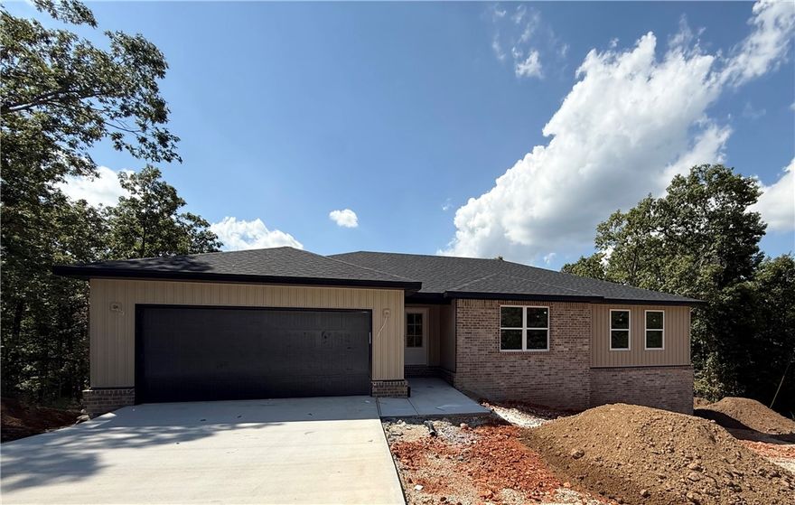 Gorgeous New Construction just a golf cart ride away from the Highlands Golf Course!!!!! The builder & designer went above and beyond on the details!! So much natural light pouring
into the living room, cozy fireplace framed by built in's and floating shelves. Open concept living and kitchen that is perfect for entertaining with a large walk in panty. Master bathroom with custom tile shower and free standing tub. The bathroom leads into the large master closet......which leads to the laundry room for easy access to hang up your clothes straight from the dryer. Beautiful modern light fixtures, plumbing fixtures, and hardware. Custom cabinetry & woodwork with a mixture of Quartz and Granite countertops throughout the home. Smart Thermostat for Energy Efficiency. The exterior has a Ring Doorbell, custom cedar shutters, covered deck, & attached 2 Car garage. Close proximity to new Interstate, Bike/Hiking Trails, Rec Centers, Golf Courses, and Lakes!!!