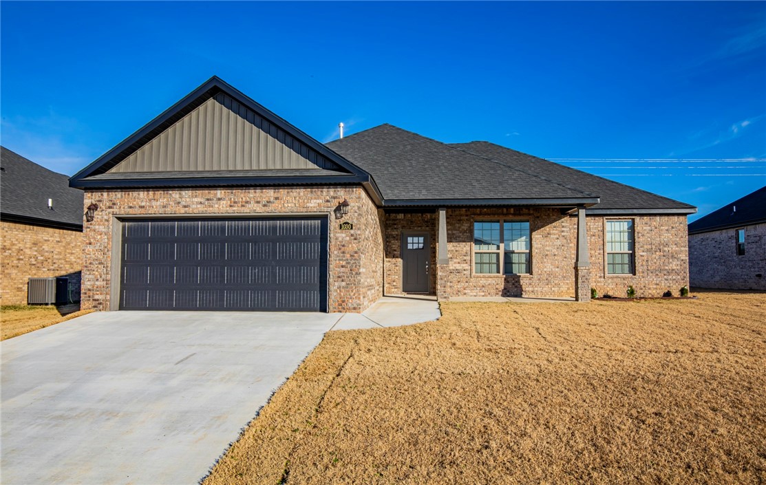 Brand new all brick home in Centerton's new subdivision Ashmore Landing. Living room features ceramic tile flooring, gas fireplace flanked by custom built ins. Open concept kitchen includes granite countertops, sink in island and full pantry. Master bathroom features separate walk-in shower and soaker tub, double vanity. Other features include 2" faux wood blinds throughout, sink in laundry room and covered back patio.