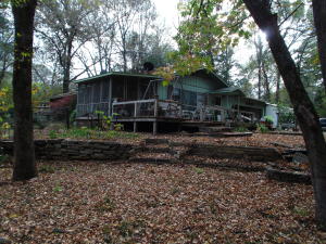 Very nice 3BD 1.5BA home that overloks a creek and nearly 20 acres. Home has recent updates and is move in ready. Proeprty offers lots of wildlife, large trees all in a park like setting. Also features a nice workshop area. This is a must see property.