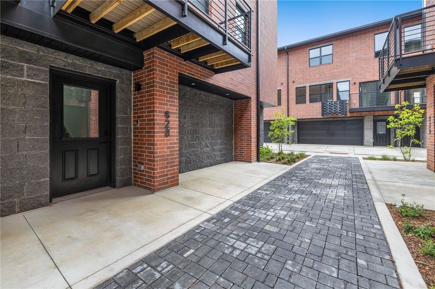 A rare opportunity to own a fully turn-key condo in one of Downtown Bentonville’s most walkable locations, 628 SW Bluebird Aly offers 1,563 sq ft, 2 bedrooms, a dedicated office, and a 2-car garage. Currently operating as a professionally managed short-term rental, this property is fully furnished with confirmed bookings in place, making it an ideal opportunity for investors, relocations, or buyers seeking flexibility.
The open-concept layout features quartz countertops, stainless steel appliances, a walk-in pantry, and modern finishes throughout. An additional office space provides flexibility for guests, a home office, or remote work. Located just minutes from Downtown Bentonville Square, Crystal Bridges, the Momentary, 8th Street Market, and the new Walmart Home Office, this property offers a seamless blend of lifestyle, location, and income potential.