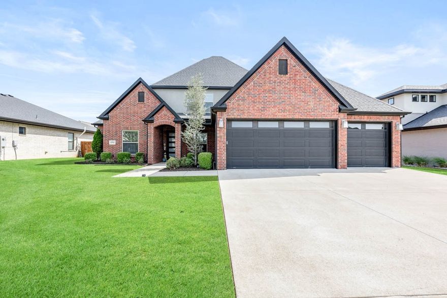 1% of purchase price incentive to be used towards closing cost! Nestled within the prestigious gated community of Scissortail, this exquisite home epitomizes luxury living. Expansive living room, wood flooring, marble gas fireplace, natural light & coffered beam accents on the ceiling. Kitchen is a chef's dream featuring quartz countertops, stainless steel appliances, double ovens, gas range & cabinets extending to the ceiling with glass fronts. Primary bedroom is a sanctuary, offering wood floors & a spa like ensuite bath with double sinks, tub, walk-in tile shower, walk in closet & access to the laundry room. Laundry room with ample storage and mudroom with cubbies. Upstairs, a versatile bedroom with full bathroom would also be a wonderful bonus room. Outside, a large covered patio extends to overlook the landscaped, fully fenced backyard. Neighborhood amenities include: playground, pool, clubhouse with exercise facility; community right across the street and walkable to local elementary school!