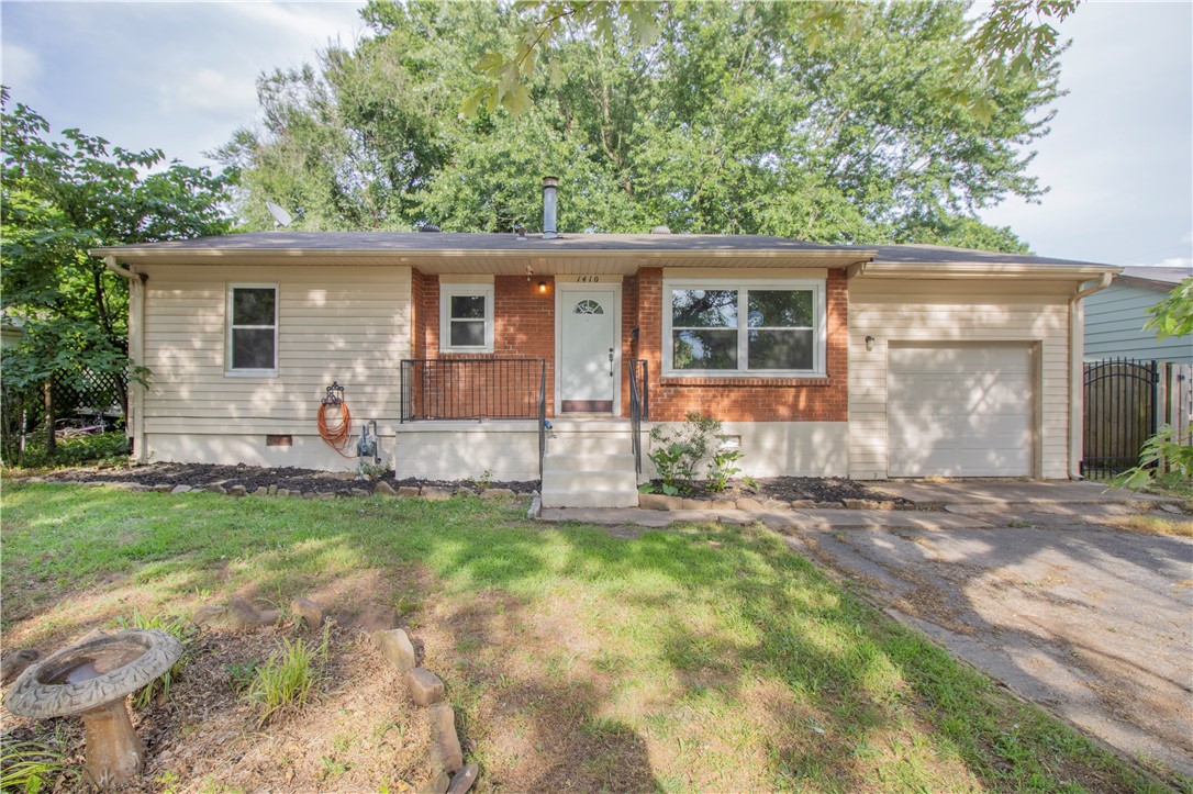 Zoned RMF-24, this south Fayetteville cutie between 15th St and MLK on almost 1/4 acre is a great investment! Just a stone's throw from Farmer's Table, with easy access to both the Greenway bike trail and I-49, this charming 3 bedroom home with garage and fully enclosed large backyard could be the perfect starter home, downsize home, or rental. Hardwood floors, adorable kitchen, and vintage flair give this 60s bungalow a cozy vibe. And if big dreams are more your speed, you can potentially add an accessory dwelling unit, or convert the property to a quadruplex or duplex!