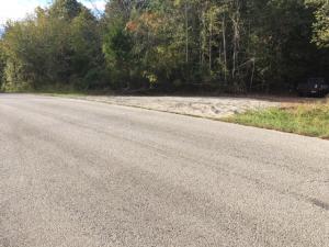 No Dirt Roads! Setting at the edge of town is this all wooded 20 Acre tract that has no land restrictions, city water is available across the road. Just come pick you out a spot to build you a Home!