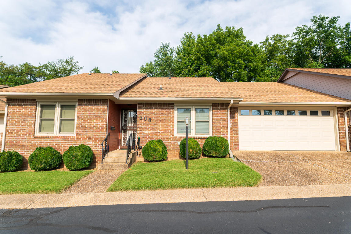 Nice large condo- vaulted ceiling, 2 car garage, newer roof, windows, appliances, heat and air.