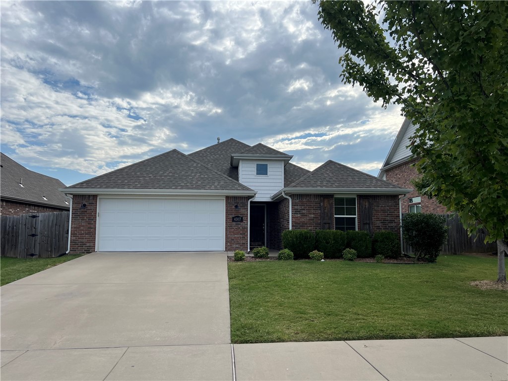 Fabulous Bentonville neighborhood with 4 great sized bedrooms, and nice, flat and fenced backyard. Enjoy the neighborhood amenities including pool, playground, fitness trails, and fishing pond. Huge, beautiful kitchen with white cabinetry, loads of storage, and massive island great for entertaining. Wood flooring in main living area and dining room. Primary suite features large fully-tiled walk in shower and big closet plus double vanities and private water closet.