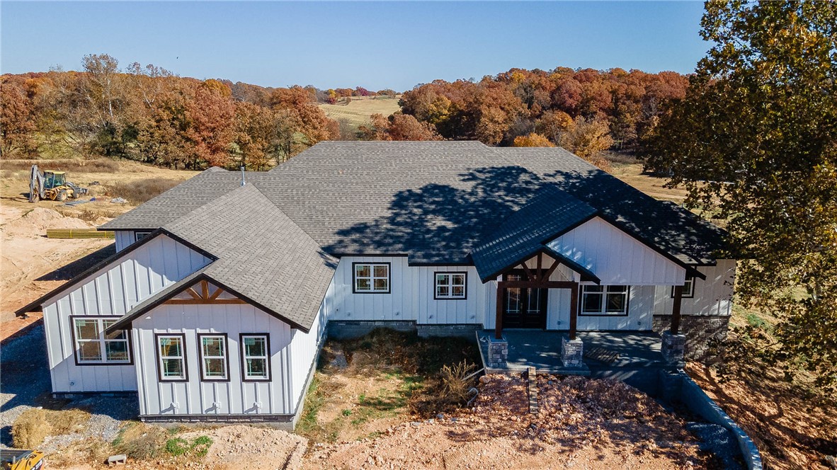 Country living at its finest and room for a shop and horses. This home has it all. Enjoy a meal cooked from your outdoor kitchen while sitting on your deck and enjoying the view. This is just one of the many features this home has that sits on +/- 2.95 acres. This home is 3424 Sq ft all on one level with 4 bedrooms and 3.5 baths. This home features a large walk in pantry, oversized laundry room, game room. office/study/formal dining room, 3 car garage with a large extra storage area, and a whole lot more. This home is priced as a spec but has features of a custom home. Don't miss out on this one.