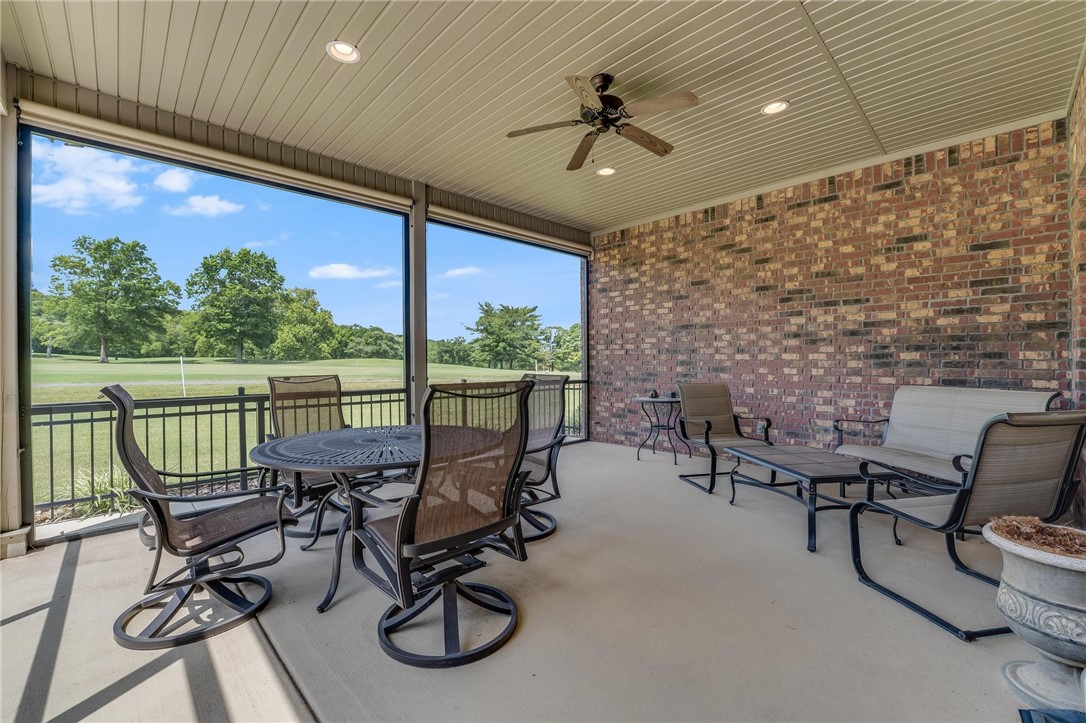 This 3 bed, 2.5 bath home sits directly on the Bella Vista Country Club Golf Course. Enjoy engineered hardwood floors, a cozy gas fireplace, and a kitchen with sleek granite countertops. This home also features a bonus room that could be used as a home office or formal dining room. A screened patio offers serene fairway views, sprinklers and included lawn care make maintenance a breeze. Comes with an underground 500-gallon propane tank for added convenience. This combines comfort plus location in one amazing home.