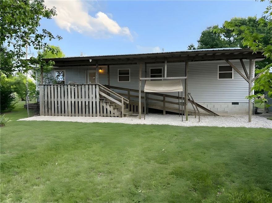 Situated in a highly desirable area with a scenic country setting, this property offers a rare combination of comfort, functionality, and potential. The well-maintained home is complemented by a versatile garage/shop, ideal for storage, hobbies, or workspace needs. A spacious barn provides excellent accommodations for livestock, while multiple fenced pastures make this property well-suited for agricultural use or recreational enjoyment.
Mature shade trees enhance the natural beauty of the landscape, creating a peaceful and inviting environment. A handicap-accessible entrance from the driveway to the front porch adds convenience and accessibility. Surrounded by well-kept, attractive homes, this property presents an outstanding opportunity to create a true showplace tailored to your vision.