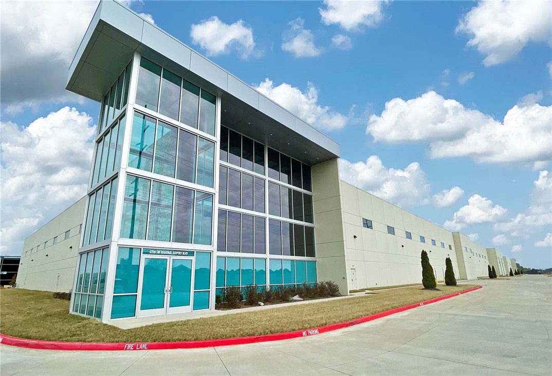 The property in located in the Crossmar Industrial Park, a master-planned park just north of the Walmart Regional Distribution Centers, the Northwest Arkansas National Airport with direct access to Interstate 49. The property totals 275,000 square feet of clean warehouse space and can be subdivided with a minimum of 137,500 square feet. It includes 30 dock doors and four oversized roll-up doors
with drive-ins and tilt wall construction with a modern facade. Current lease expires January 31, 2032. Contact broker for scheduled tours.