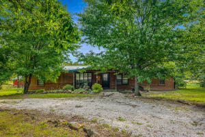 Absolutely beautiful 27 acre farm in the highly desired Hilltop community. Land lays great with a nice mixture or pasture and timber. Charming 5 BR, 3 BA home with a wood burning fireplace with lots of decorative Arkansas rock work. The home features 2 back decks and a finished partial basement. Property has abundant wildlife, outbuildings, and even a barn. Home has cedar siding and a new metal roof in 2018. Located just minutes from Center Point, Big Bluff and other trail heads and canyons of the Buffalo National River wilderness.