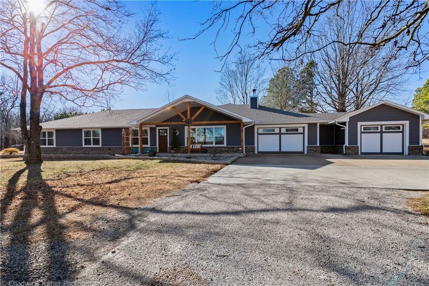 Fully remodeled in 2019.  New everything!  (New Plumbing, New Electrical, New Drywall, etc)  Over 1,100 square feet added to the home.  Professional grade appliances. Brand new septic system, Granite countertops throughout.  In ground Storm Shelter in Master Closet. New well equipment.  40x30 barn with workshop. 20x30 workshop that can be additional garage space.  14.82 acres - all level.  7 acres are wooded.  Private driveway.  Opportunity to subdivide or develop.