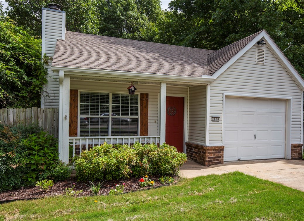 Cute 2BR/2BA home off Wedington. Great location! Close to I-49, shopping, restaurants, businesses, and more! Open living and dining, wood burning fireplace, tall ceilings and laminate wood flooring throughout. 1.5 year old hot water heater, dishwasher, microwave, oven, and gutters.