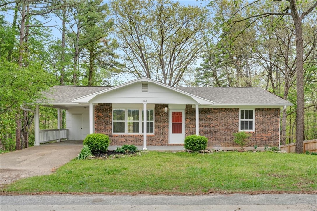 Charming property on quiet street in the heart of town. Situated just off Highway 62, this beautifully renovated property offers the perfect blend of peace and convenience. Located in a serene part of town, yet minutes of local amenities, this property is a rare find. A new roof, updated HVAC system, new electrical work, freshly painted interior and luxury vinyl plank flooring throughout. Kitchen equipped with all new appliances. French doors open to a new deck ideal for relaxing and enjoying the view. The unfinished lower level allows you to customize to your taste, offering additional value and versatility. Note: Lower level is not included in the square footage adding an additional 1008 sq ft. The property is zoned commercial making it an excellent investment for either short-term or long-term rental opportunities. Whether you are searching for a peaceful retreat or a lucrative business venture this property is brimming with possibilities.
