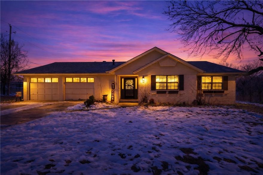 Your country home awaits! Enjoy living, playing, and relaxing at this beautiful 3 Bed, 2 Bath home with  on nearly 1 acre in Prairie Grove, AR! Conveniently located between Prairie Grove and Farmington with easy access to schools, shopping, and NWA vibes! Only 15-20 min to Fayetteville.  The primary suite offers an ensuite bath and walk-in closet. A cozy fireplace in the living room offers warmth and relaxation.  This home offers both an eat-in kitchen and a formal dining area. Schedule your showing soon before it's gone!