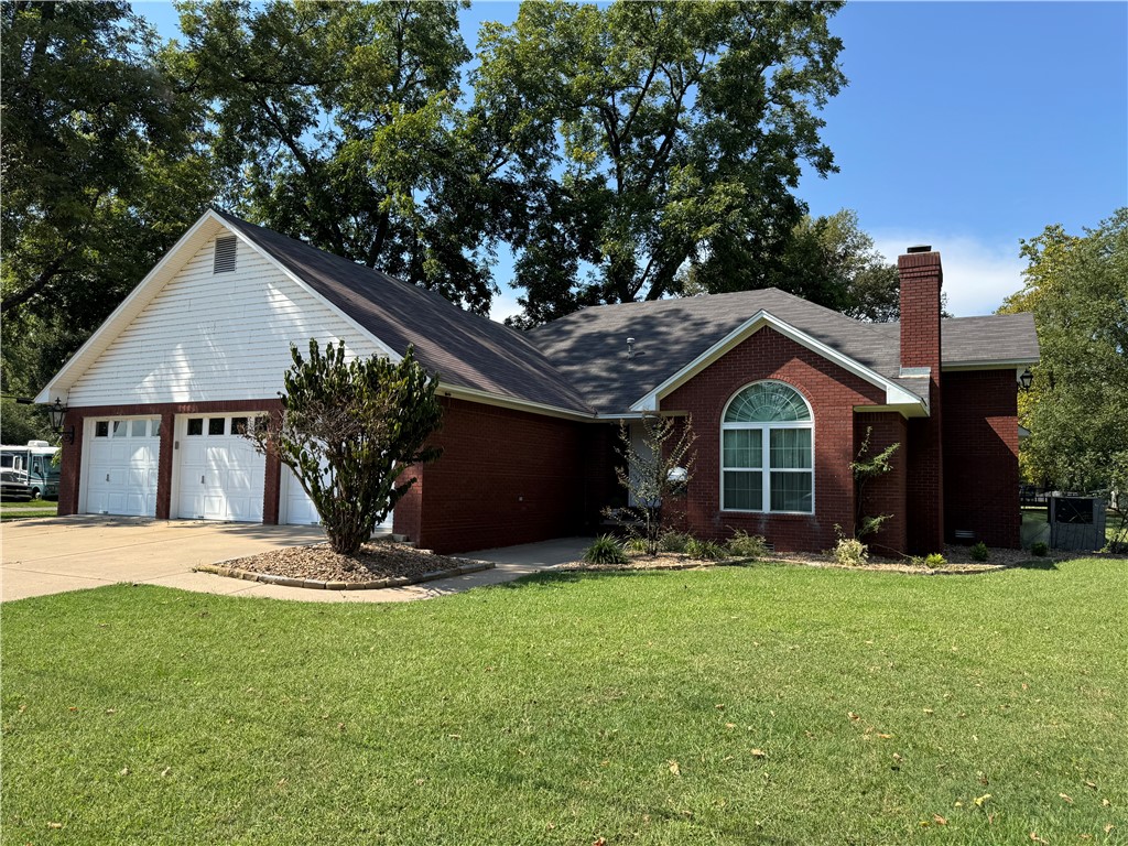 Welcome to this beautifully maintained custom brick home, offering exceptional curb appeal and thoughtful upgrades throughout. Featuring a spacious 3-car garage and additional outdoor storage, this property perfectly blends functionality with luxury. Step inside to discover fresh paint, brand new flooring, and elegant custom drapes that complement the light-filled spaces. The kitchen has new Jennair cooktop. Enjoy the ambiance of two exquisite Swarovski crystal chandeliers, adding a touch of glamour to your living and dining areas. Most of the landscaping has been recently refreshed, creating a polished outdoor look.