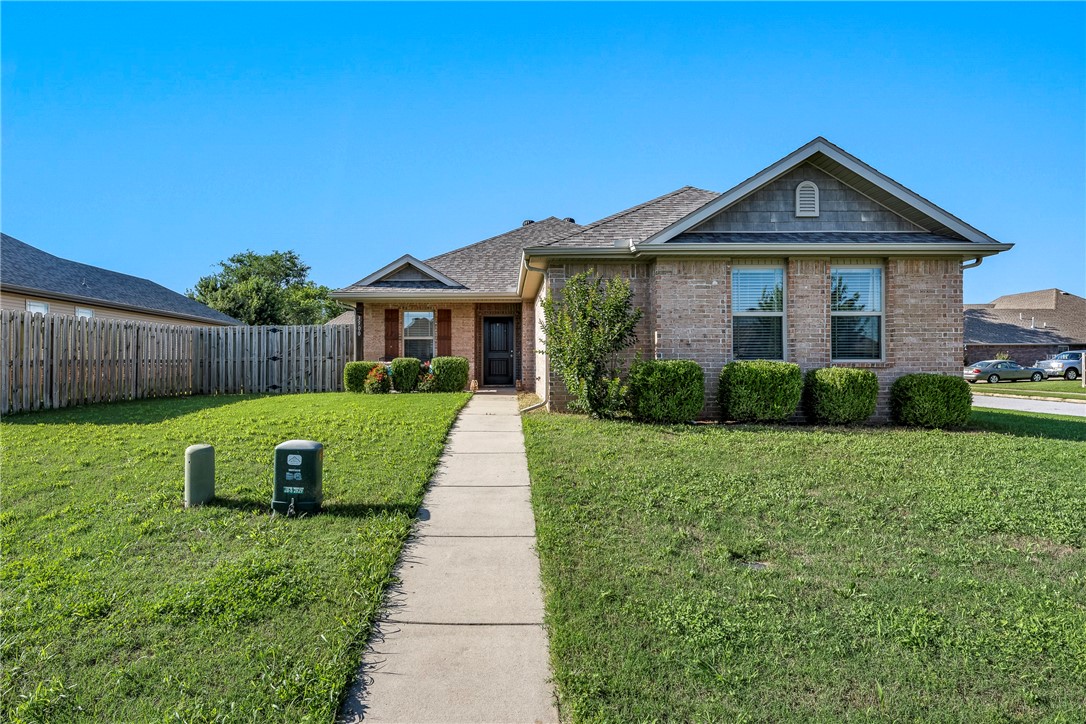Welcome home! Fully furnished! 2016 well maintained and like brand new home in a desirable location. Within walking distance of schools. Minutes away from downtown Bentonville, trail system, shopping, and I540 for easy daily commute. Home features; 3 Bedrooms, 2 Bathrooms, Utility Room, 2 car garage, & patio off side of home. Covered porch at both front & back of home. Living Room with vaulted ceilings and natural lighting. Eat-in kitchen features granite counter tops, double stainless sink, & pantry. Primary suite features vanity w/ full mirror and enormous walk-in closet. Vinyl & brick maintenance free exterior. Excellent potential for long- or short-term rental.