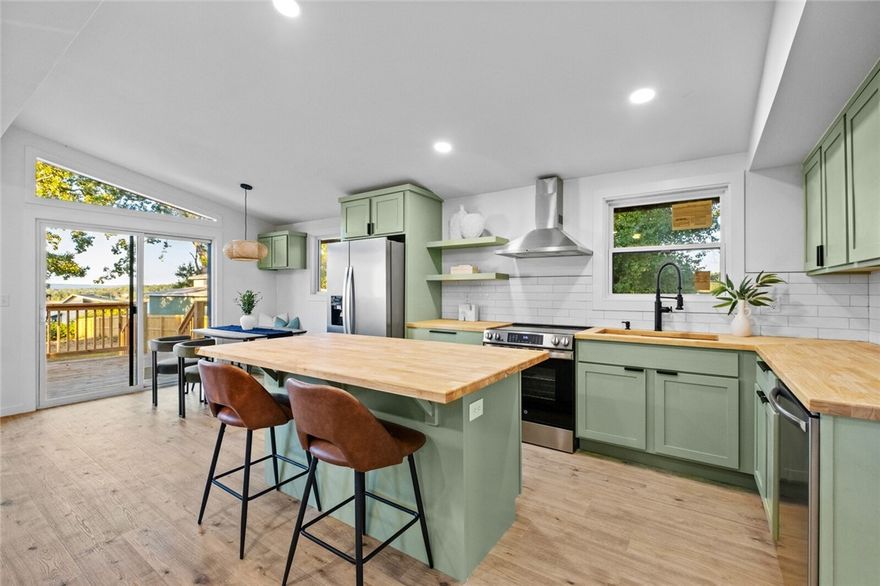 This exciting Lakeview home is a complete remodel, where everything was given love. Enjoy a piece of mind with new electrical, plumbing, HVAC, appliances, cabinets, fixtures, flooring, roof, landscaping, and much more.

Inside, enjoy a completely renovated space with an open, airy layout, updated flooring, modern lighting, and a designer kitchen ready for entertaining. Large windows invite in abundant natural light while offering peaceful amazing lake views.

Step outside and you’re moments away from the water — ideal for boating, fishing, or soaking in the NWA lake lifestyle. Enjoy the year-round lake views from your back porch or drop your boat in the neighborhood boat ramp or local marinas nearby. Plus, the restaurants and watering holes downtown rogers are just a short drive away! Whether you’re looking for a full-time home, weekend getaway, or Airbnb investment, this turnkey property delivers modern comfort and lake-life charm.