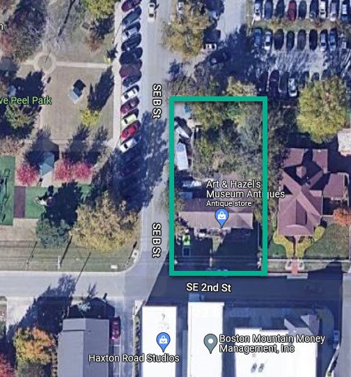 Sold for redevelopment of land in the heart of Bentonville.