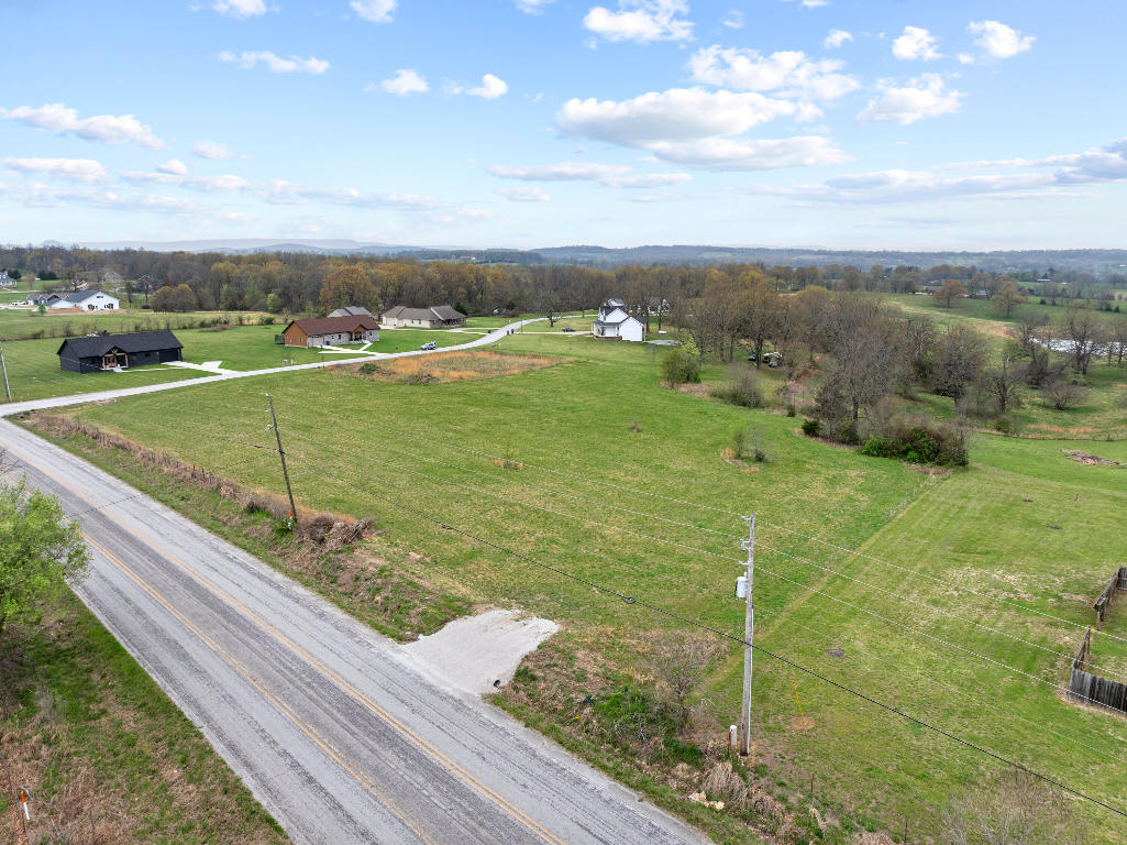 Great building lot with over 1 acre of land & it sits in a fantastic location North of Harrison! Situated just North of Harrison on Old Hwy 65N in the coveted North Ridge Estates Subdivision, is this 1.26 acre lot. Mostly level, this lot also boasts paved road frontage with a new driveway & culvert recently installed for easier access off of Ridgeway Loop (Old Hwy 65).